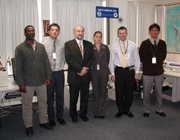 WMO Secretary-General visits 
       the WPC International Desks - August 5, 2003