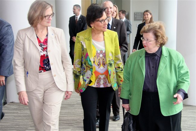 Acting NOAA Administrator Dr. Kathryn Sullivan (left), Commerce Secretary Penny Pritzker (center), and Senator Barbara Mikulski (MD) (left)
            arrive at the operations area of NCWCP.