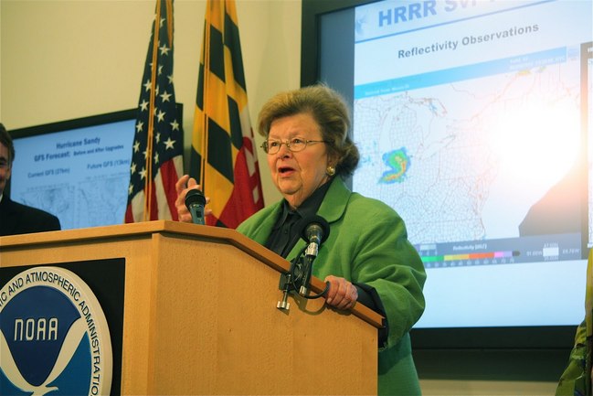 Senator Mikulski (MD) briefs the press, highlighting the partnership between government and private sector and the serious impact of weather on life, property, and the economy.